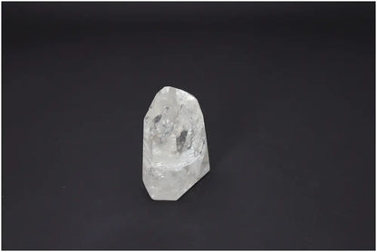 Lemurian Quartz Obelisk on black background, reflecting spiritual and energetic properties with chakra and zodiac associations.