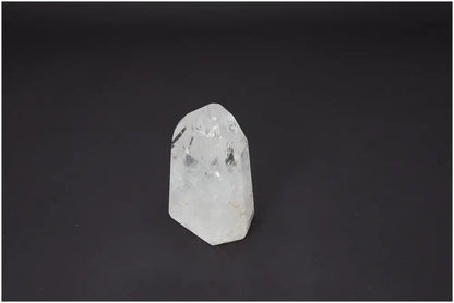 Lemurian Quartz Obelisk on black background, enhancing spiritual needs with unique chakra and zodiac properties.