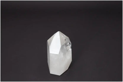 Lemurian Quartz Obelisk with spiritual properties, supports chakras and zodiac signs for energetic balance.