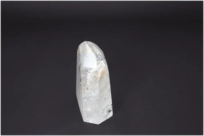 Clear Lemurian Quartz Obelisk for chakra and zodiac alignment, showcasing unique spiritual and energetic properties for body and soul.