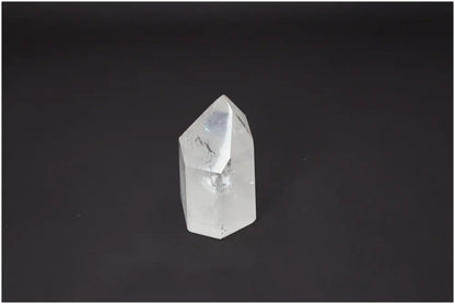 Lemurian Quartz Obelisk on a black background showing its unique crystal clarity and spiritual properties.