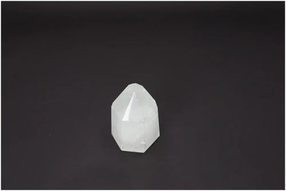 Lemurian Quartz Obelisk, a crystal known for supporting chakras and zodiac signs, enhancing energetic and spiritual balance.
