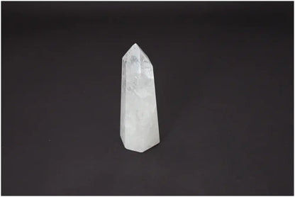 Lemurian Quartz Obelisk with unique energetic properties for chakra alignment and spiritual enhancement.