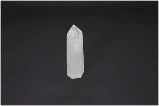 Lemurian Quartz Obelisk on dark background, showcasing its unique color and spiritual properties for chakra alignment and zodiac support.