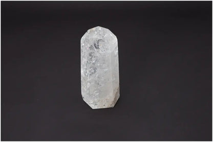 Lemurian Quartz Obelisk against black background showcasing unique properties and spiritual connections.
