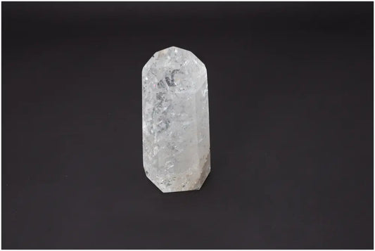Lemurian Quartz Obelisk against black background showcasing unique properties and spiritual connections.