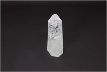 Lemurian Quartz Obelisk on black background showcasing its clarity and natural form, ideal for energy amplification and personal growth.