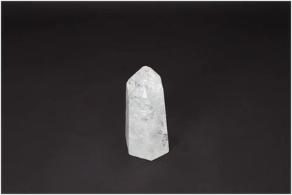 Lemurian Quartz Obelisk crystal on black background, known as Master Healer, enhances clarity and balance, ethically sourced and hand-selected.