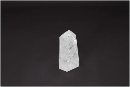Lemurian Quartz Obelisk - hand-selected clear crystal on dark background, enhances clarity, balance, and personal growth.