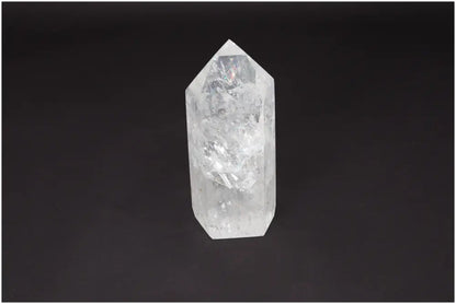 Lemurian Quartz Obelisk on black background, showcasing its natural clarity and healing properties.