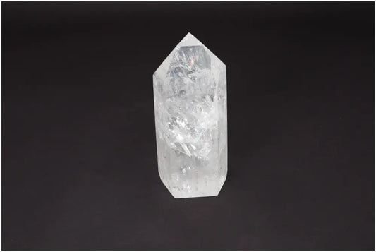 Lemurian Quartz Obelisk on black background, showcasing its natural clarity and healing properties.