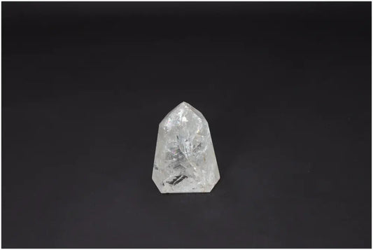 Lemurian Quartz Obelisk on black background, promoting clarity and balance. Ethically sourced, hand-selected Clear Quartz crystal.