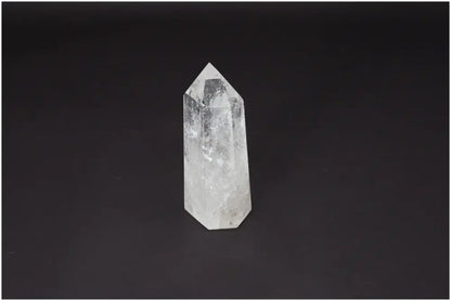 Lemurian Quartz Obelisk on black background, known as Master Healer, amplifies clarity and energy, ethically sourced and hand-selected.
