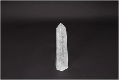 Lemurian Quartz Obelisk - clear quartz crystal for clarity, balance, and personal growth on a dark background.