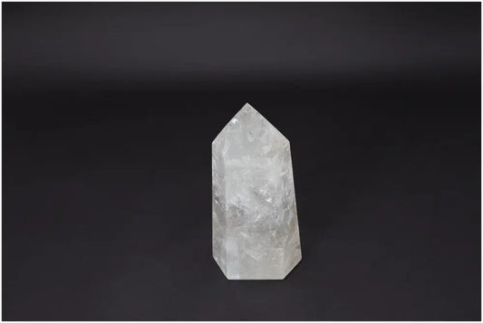Lemurian Quartz Obelisk for clarity and healing on a dark background, ethically sourced and naturally formed.