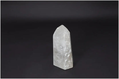 Lemurian Quartz Obelisk crystal on dark background, symbolizing clarity, balance, and personal growth. Ethically sourced and naturally formed.