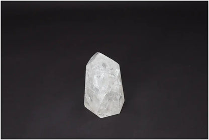 Lemurian Quartz Obelisk crystal on a dark background, showcasing its clarity and natural formation, ideal for energy and personal growth enhancement.