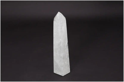 Lemurian Quartz Obelisk crystal on black background, representing clarity, balance, and personal growth through its healing properties.