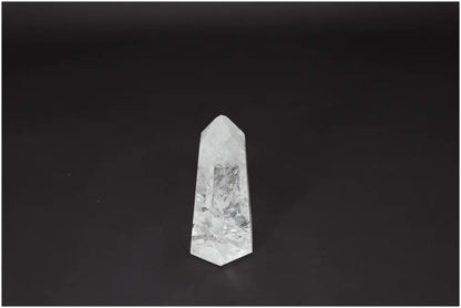 Lemurian Quartz Obelisk on a dark background, showcasing its clear and natural formation, ideal for clarity and personal growth.
