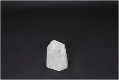 Lemurian Quartz Obelisk on dark background, clear quartz crystal for clarity, balance, and personal growth, known as Master Healer.