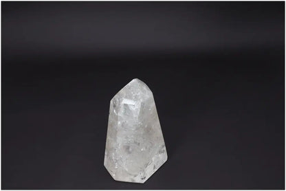 Lemurian Clear Quartz Obelisk for clarity, balance, and personal growth on black background