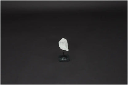 Lemurian Quartz crystal on a sleek metal stand against a dark background, ideal for promoting clarity and balance.