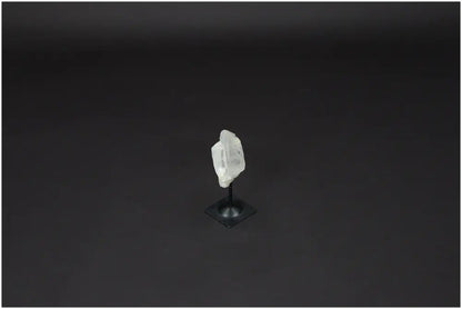 Lemurian Quartz crystal on elegant metal stand, promoting clarity and balance, ideal for personal growth and energy amplification.