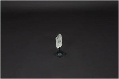 Lemurian Quartz crystal on elegant metal stand, known as the "Master Healer" for energy amplification and balance. Ethically sourced.
