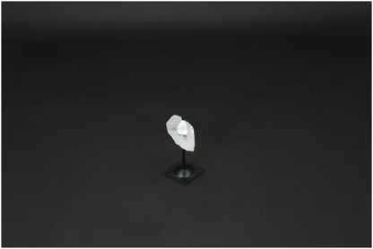 Lemurian Quartz crystal on a sleek metal stand, emphasizing clarity, balance, and personal growth as the "Master Healer."