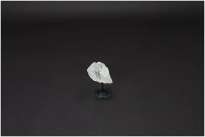 Lemurian Quartz on black metal stand for clarity and balance, hand-selected and ethically sourced crystal for personal growth.