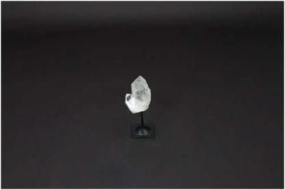 Lemurian Clear Quartz on Metal Stand, a powerful purification stone, neutralizes negative energy and electromagnetic radiation.