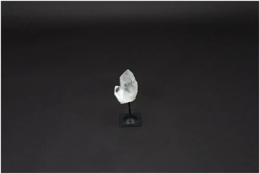 Lemurian Clear Quartz on Metal Stand, a powerful purification stone, neutralizes negative energy and electromagnetic radiation.