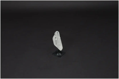 Lemurian Quartz crystal on a sleek metal stand for purification and energy harmony, absorbs negative vibrations and EM radiation.