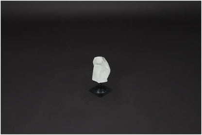 Lemurian Clear Quartz on metal stand for cleansing negative vibes and electromagnetic protection, ideal for personal and spatial harmony.