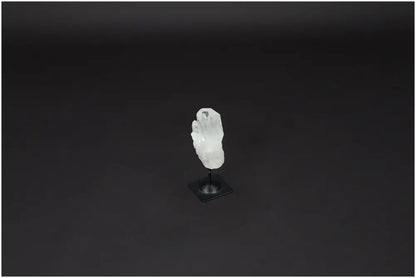 Lemurian Quartz crystal on metal stand, known for purification and harmonizing energy, ideal for neutralizing negative vibrations.