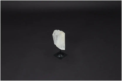 Lemurian Quartz on metal stand, clear crystal for purification, harmonizing energy, and detoxifying spaces from negative vibrations.