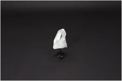 Lemurian Quartz on metal stand, clear crystal for purification and harmonizing energy, ideal for dispelling negativity and cleansing spaces.