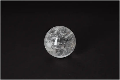 Lemurian Quartz Sphere 6-7 CM with radiant energy, subtle striations, and luminous clarity for spiritual growth and inner clarity.