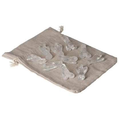Lemurian Small Angel Clear Quartz figurines on linen pouch, promoting purification and energy harmonization.