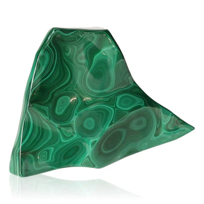 Vibrant green malachite gemstone with unique banded patterns, symbolizing nature's calming and energizing essence.