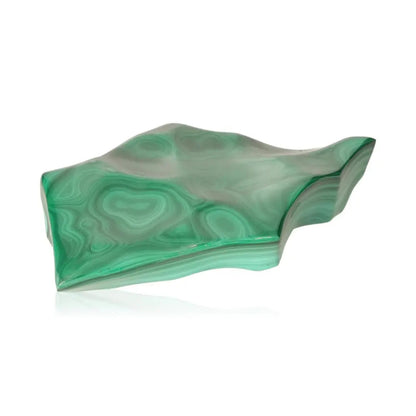 Polished malachite gemstone with swirling green patterns, symbolizing transformation and soothing energy.