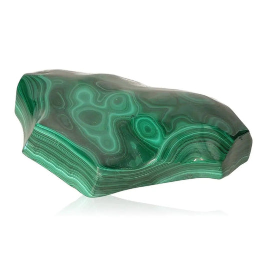 Polished malachite gemstone with green swirling patterns, known for promoting tranquility and courage; ideal for meditation and healing.