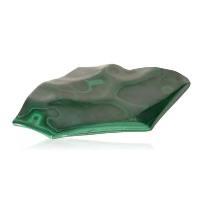 Lustrous green Malachite gemstone with soothing energy and courage-boosting properties, perfect for navigating life's changes.