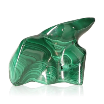 Polished malachite stone with swirling green patterns, symbolizing natural soothing energy and promoting courage and optimism.