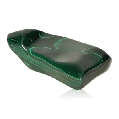 Polished green malachite stone emitting soothing and energizing energy, ideal for boosting courage and positivity.