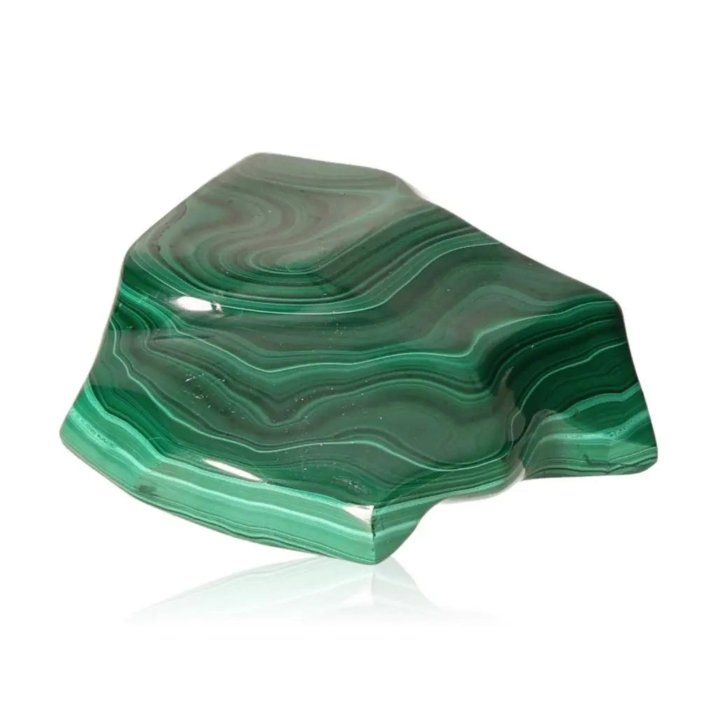 Polished green Malachite gemstone with swirling patterns, symbolizing courage and hope for inner harmony and positivity.