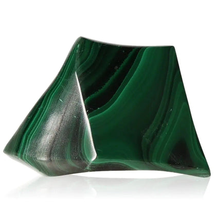 Polished malachite gemstone with vibrant green bands, known for its soothing energy and inspirational qualities.