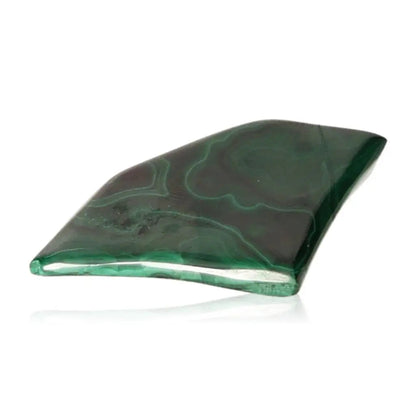 Polished malachite stone showcasing rich green hues, representing nature's beauty and tranquility, perfect for energizing and calming your spirit.