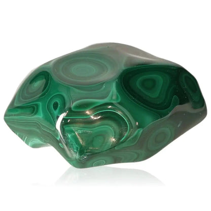 Vibrant malachite stone with deep green hues and swirling patterns, representing nature's soothing energy and spiritual benefits.