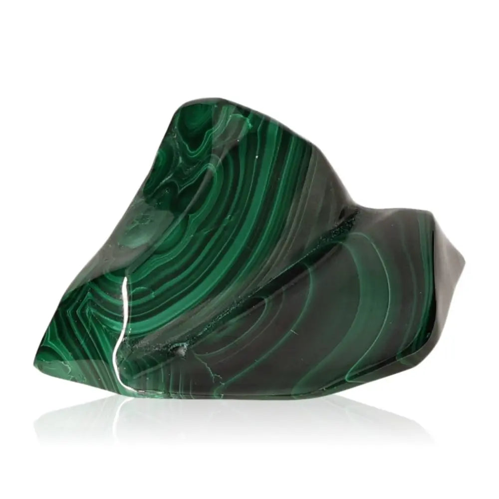 Polished Malachite stone displaying vibrant green swirls, known for its soothing energy and transformative properties.